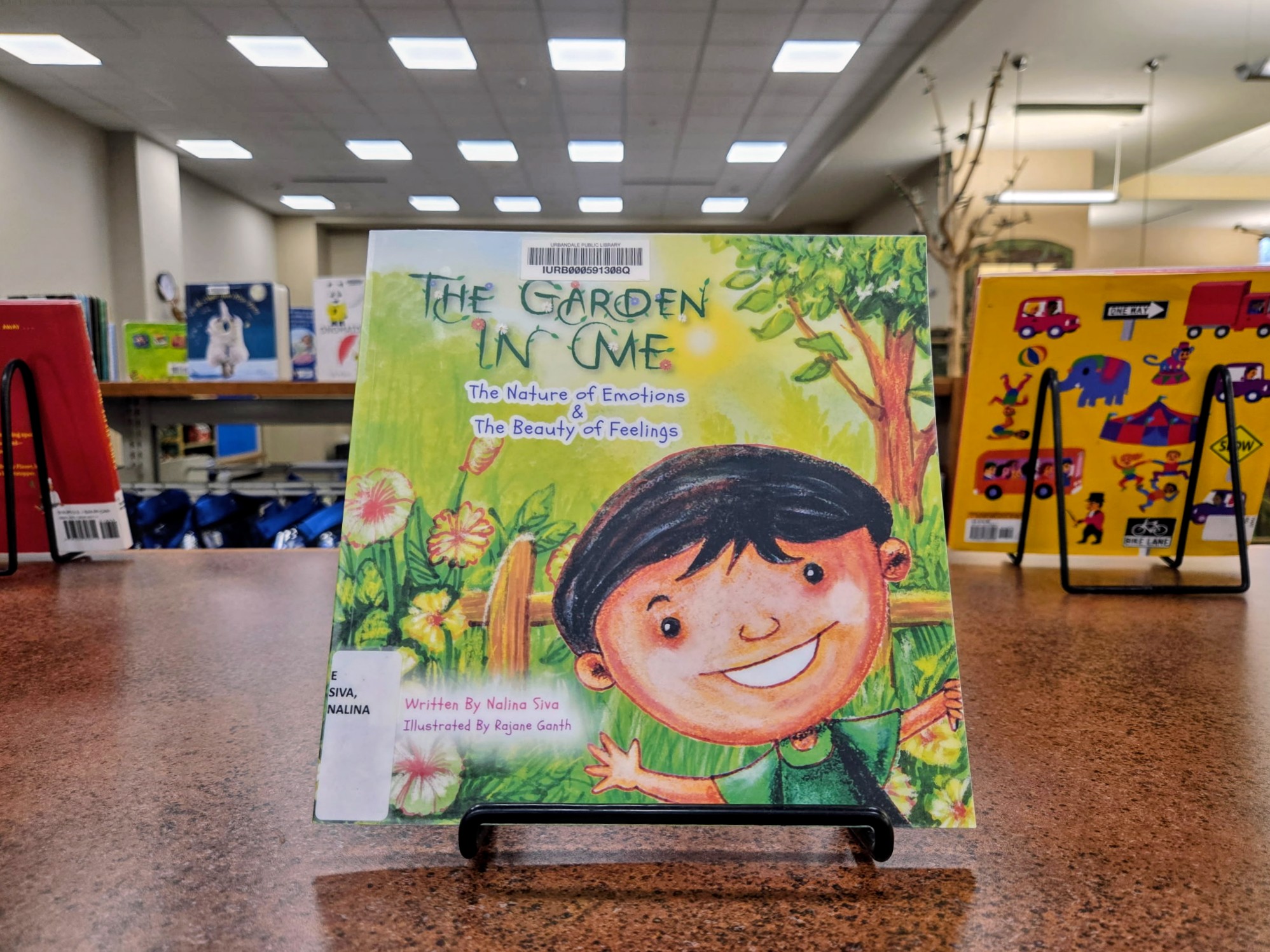 The Garden In Me displayed in a library or bookstore setting